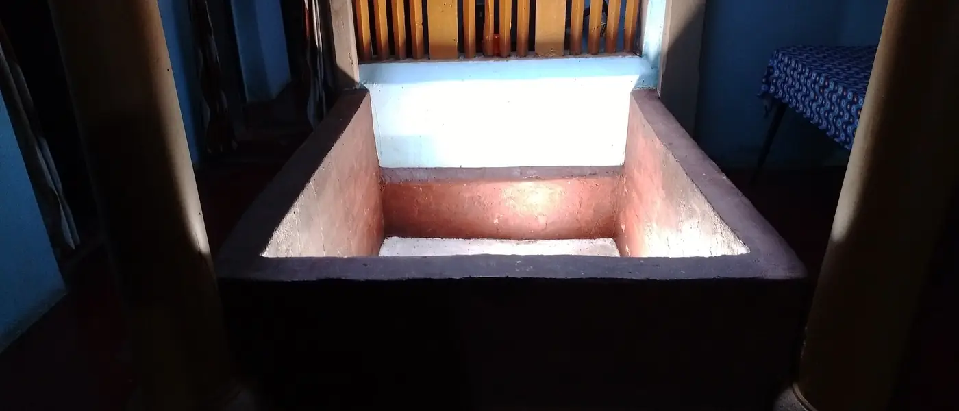 The open central courtyard (nadumuttam) of a traditional nalukettu house in Kerala