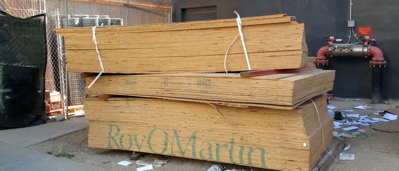 A stack of plywood panels