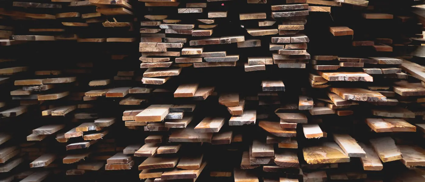 Sawn wooden planks stacked on top of each other